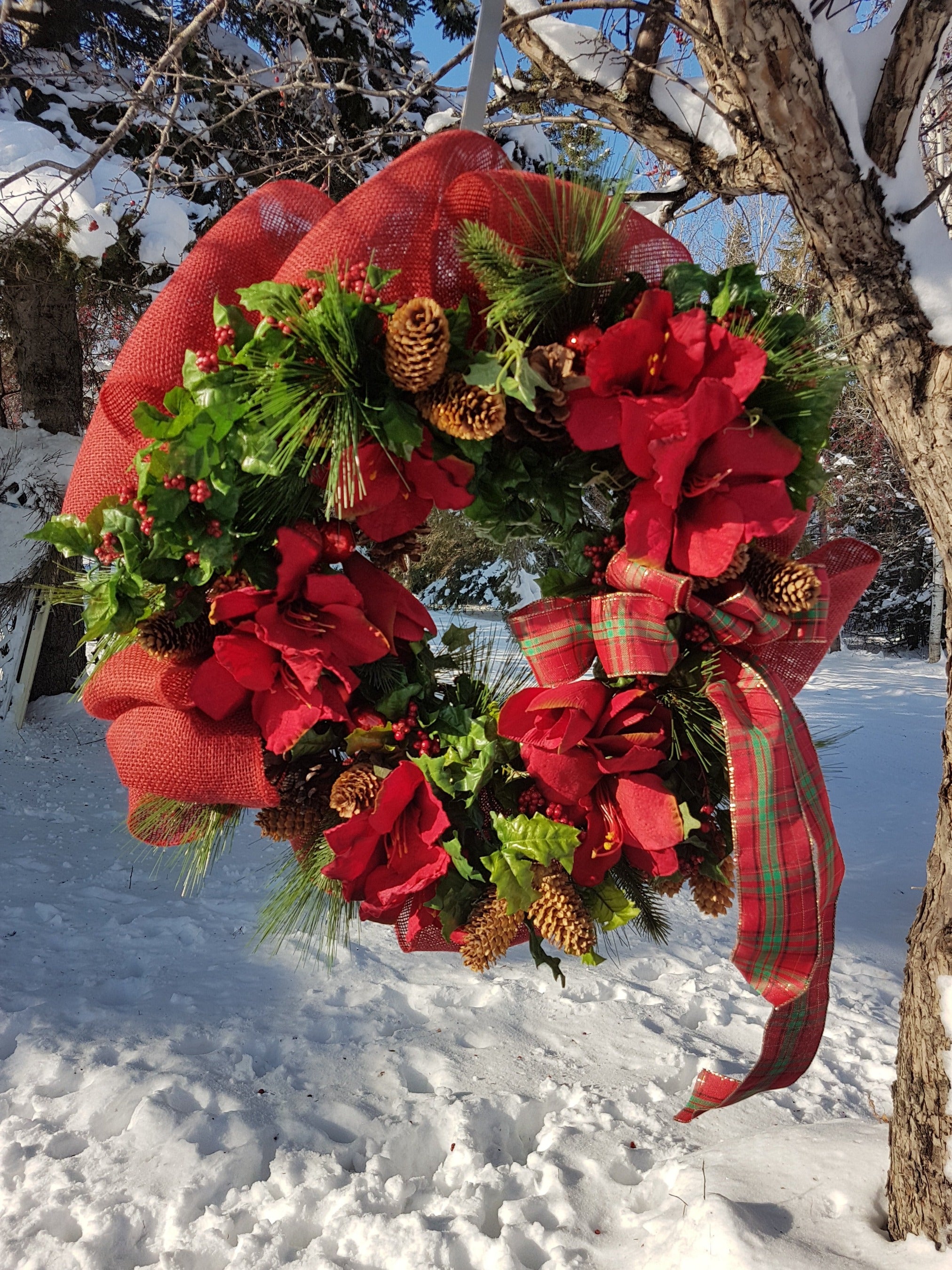 Red amaryllis wreath with burlap