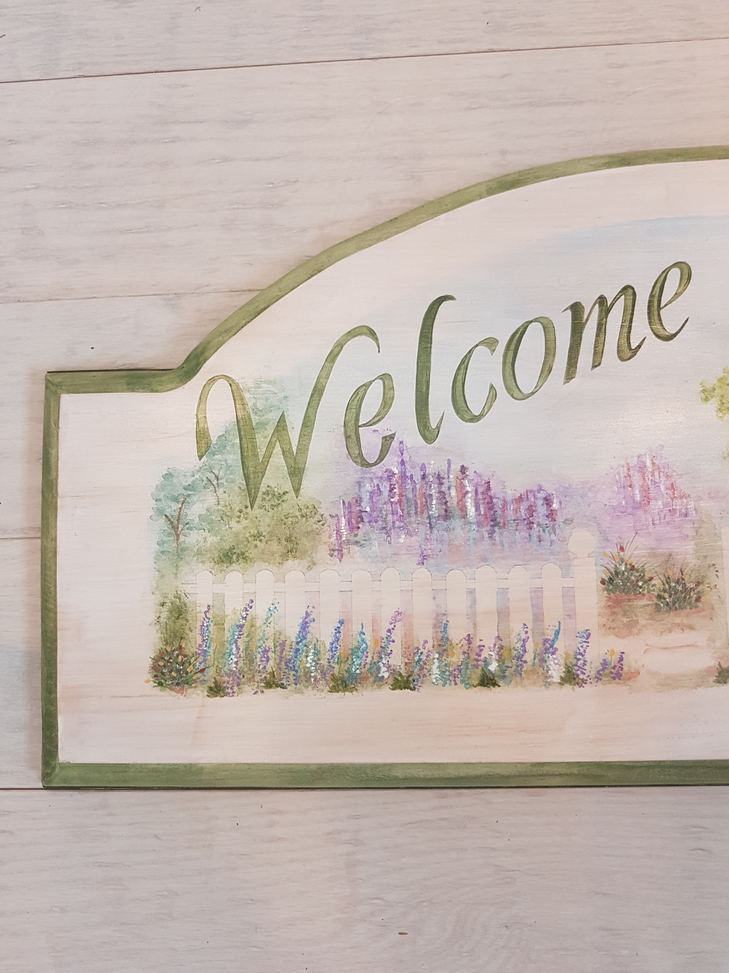 Welcome sign, hand-painted.